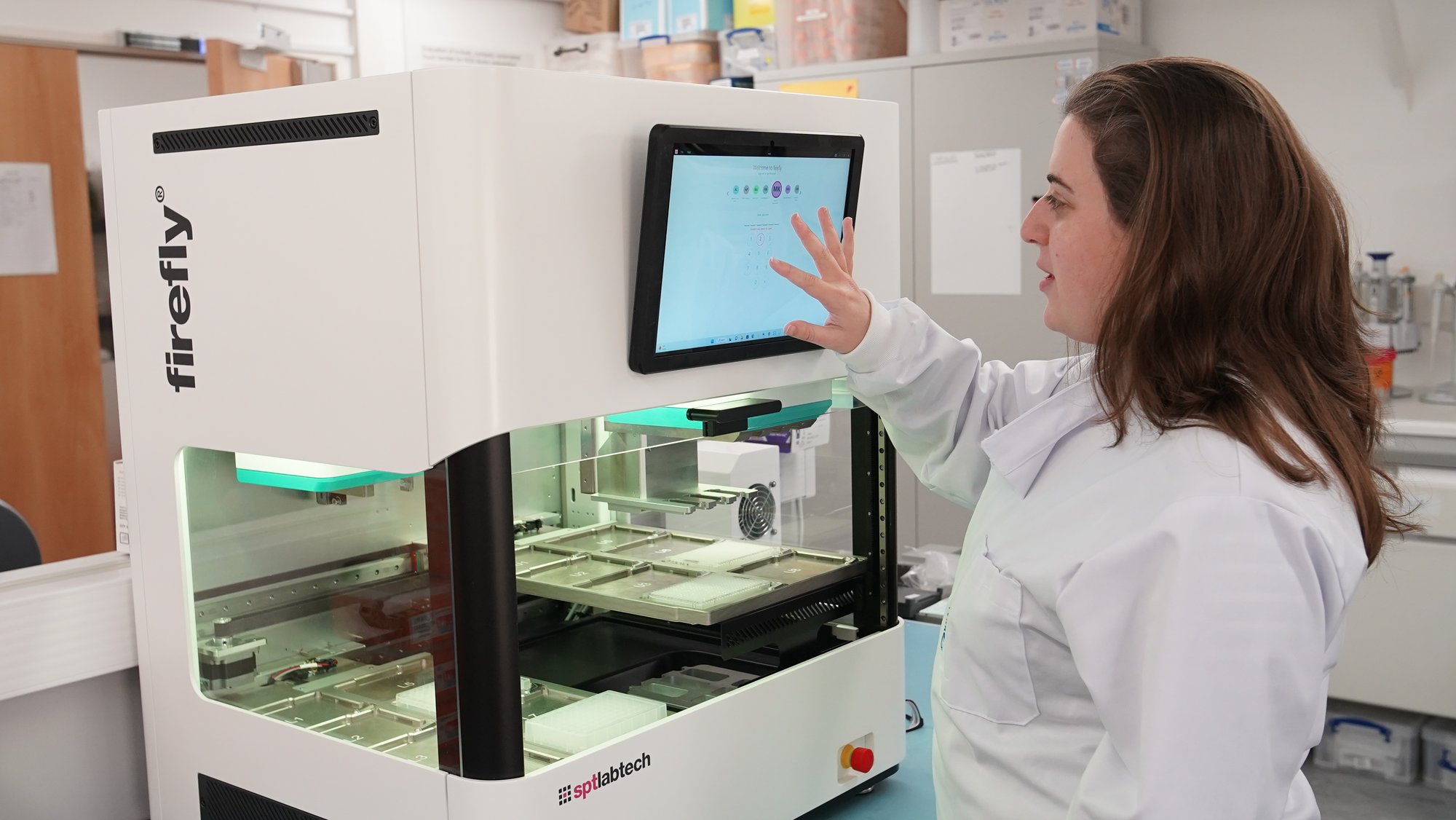 Denise Grovewood, Diagnostics Product Manager at SPT Labtech, with firefly all-in-one liquid handler for LDT